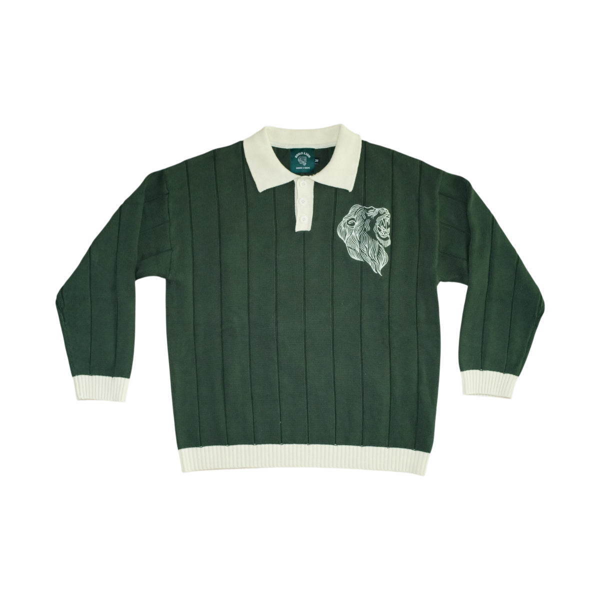 A dark green ribbed knit rugby sweater with a cream collar, cuffs, and hem, featuring a white embroidered lion head on the left chest.